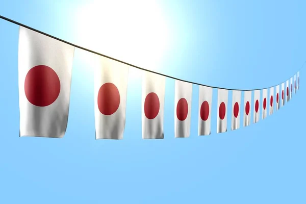 Wonderful many Japan flags or banners hangs diagonal on string on blue sky background with bokeh - any holiday flag 3d illustration — ストック写真