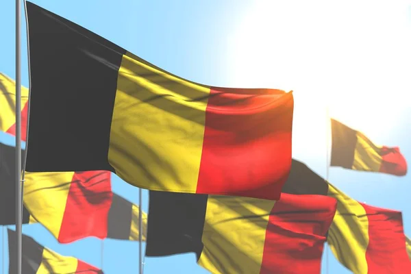Bonito muchas banderas de Bélgica son ola contra la imagen del cielo azul con enfoque suave - cualquier ilustración 3d bandera de vacaciones — Foto de Stock