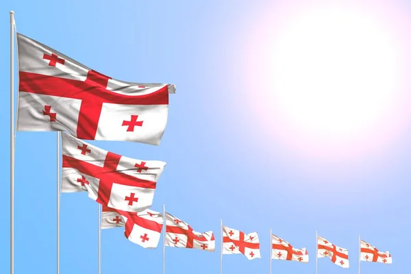 nice many Georgia flags placed diagonal on blue sky with space for your content - any feast flag 3d illustration