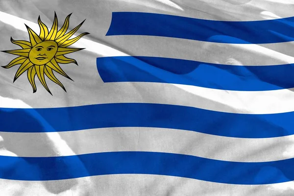 Doku veya arka plan olarak kullanmak için Uruguay bayrağı sallayarak, bayrak rüzgar da çırpınıyor — Stok fotoğraf