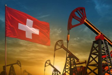 İsviçre petrol endüstrisi kavramı. Endüstriyel illüstrasyon - İsviçre bayrağı ve petrol kuyuları karşı mavi ve sarı günbatımı gökyüzü arka plan - 3d illüstrasyon