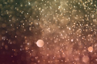 turuncu düşen parıltılar bir sürü bir renk bokeh doku - harika soyut fotoğraf arka plan