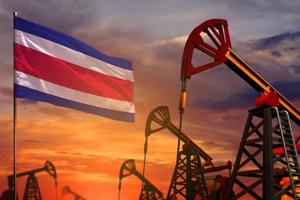 Concepto de industria petrolera de Costa Rica. Ilustración industrial - Bandera de Costa Rica y pozos de petróleo con el fondo rojo y azul del cielo al atardecer o al amanecer - Ilustración 3D —  Fotos de Stock