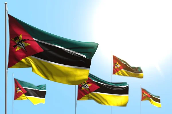 Belle 5 bandiere del Mozambico sventolano contro foto cielo blu con bokeh - qualsiasi occasione bandiera 3d illustrazione — Foto Stock