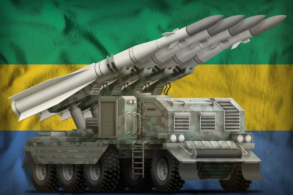 Taktické rakety krátkého dosahu s arktickou kamufláž na pozadí vlajky Gabonu. 3D ilustrace — Stock fotografie