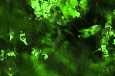 güzel vintage yeşil rastgele boyanmış tuval, tasarım amaçlı renk boya lekeleri ve lekeler doku ile kumaş.