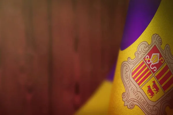 Gaziler günü veya anma günü onuruna Andorra bayrağı. Kırmızı bulanık doğal ahşap duvar arka plan üzerinde savaş kavramıandorra kahramanları Glory. — Stok fotoğraf