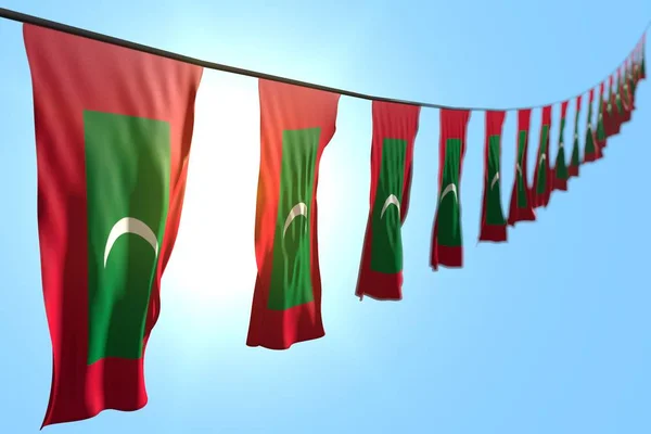 nice many Maldives flags or banners hangs diagonal on rope on blue sky background with soft focus - any holiday flag 3d illustration