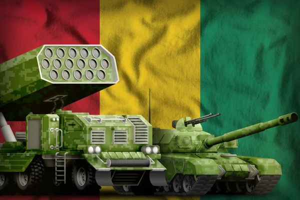 Guinea heavy military armored vehicles concept on the national flag background. 3d Illustration