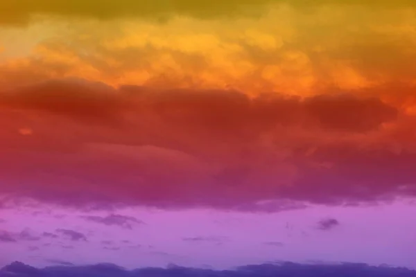 lovely unreal bright fantasy sun colored clouds for using in design as background.