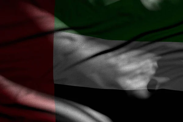 Belle photo de sombre drapeau des Émirats arabes unis avec des plis se trouvent dans l'ombre avec des taches de lumière sur elle - tout drapeau de célébration illustration 3D — Photo