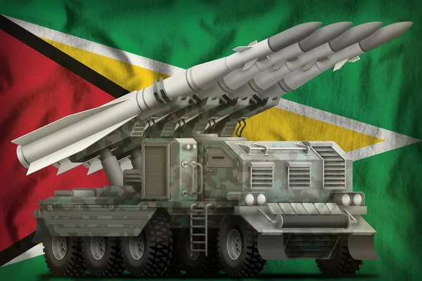 Taktikai rövid hatótávolságú ballisztikus rakéta a sarkvidéki álcázás a Guyana nemzeti zászló hátterében. 3D illusztráció — Stock Fotó