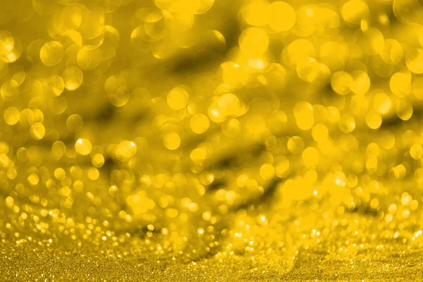 Orange brillanter Metallsand aus Glitzern - glänzendes Konzept mit Bokeh-Textur - fantastischer abstrakter Fotohintergrund — Stockfoto