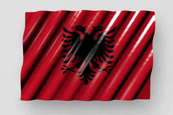 nice glossy flag of Albania with large folds lying flat isolated on grey - any occasion flag 3d illustration
