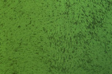 arka plan olarak kullanmak için oldukça yaşlı yeşil kaba boyalı metalik yüzey dokusu.