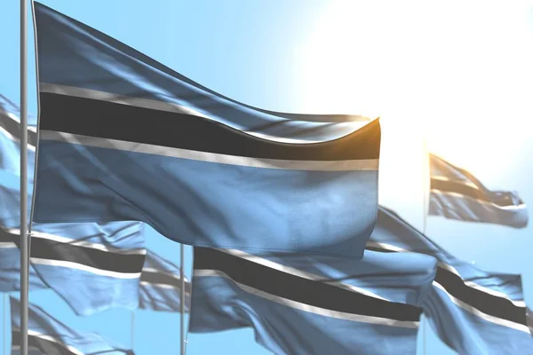 Nice many Botswana flags are waving against blue sky illustration with bokeh - any holiday flag 3d illustration — Stock Photo, Image