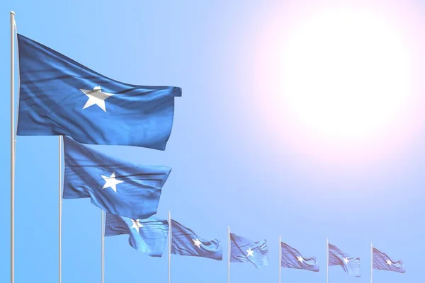 Prachtige vele Somalische vlaggen geplaatst diagonaal op blauwe hemel met ruimte voor uw inhoud - elke gelegenheid vlag 3d illustratie — Stockfoto