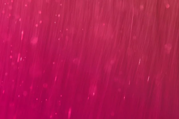 Roze briljant vallende glitters lange belichting textuur - mooie abstracte foto achtergrond — Stockfoto