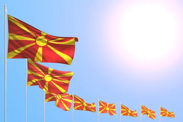 Meravigliose molte bandiere Macedonia poste diagonalmente sul cielo blu con spazio per il testo - qualsiasi occasione bandiera 3d illustrazione — Foto Stock