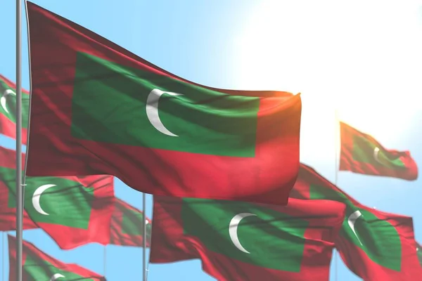 Красиво многие мальдивские флаги стоят на фоне голубого неба с боке - любой праздничный флаг 3d иллюстрация — стоковое фото
