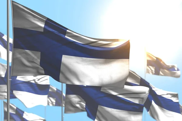 Assez nombreux drapeaux de la Finlande sont vagues contre image ciel bleu avec mise au point sélective - tout drapeau de fête illustration 3d — Photo