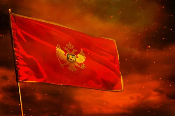 Wisząca flaga Czarnogóry na czerwonym niebie z tłem słupów dymu. Koncepcja problemów. — Zdjęcie stockowe