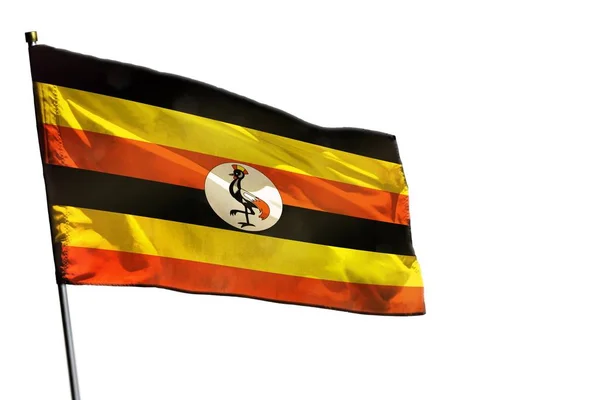 Flatternde Ugandaflagge auf klarem weißem Hintergrund isoliert. — Stockfoto