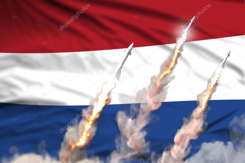 Netherlands ballistic warhead launch - modern strategic nuclear rocket weapons concept on flag fabric background, military industrial 3D illustration with flag
