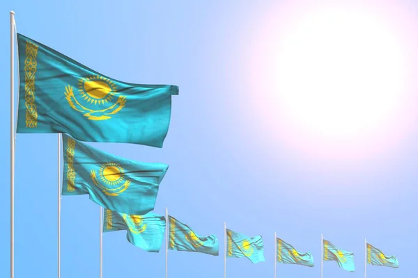 nice many Kazakhstan flags placed diagonal on blue sky with space for text - any holiday flag 3d illustration