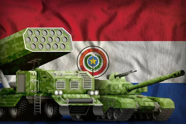 tank and rocket artillery with summer pixel camouflage on the Paraguay flag background. Paraguay heavy military armored vehicles concept. 3d Illustration