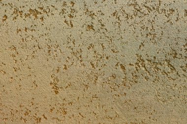 arkaplan olarak kullanılacak alçı dokusu gibi eski bir turuncu taş.