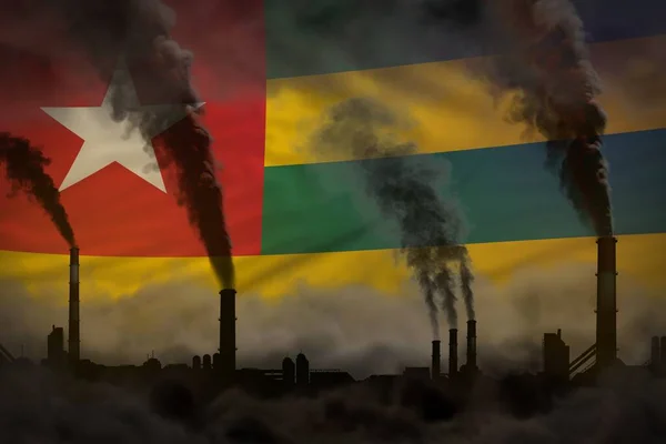 Global warming concept - heavy smoke from industrial chimneys on Togo flag background with space for your logo - industrial 3D illustration