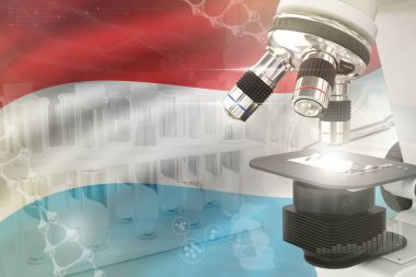 Lüksemburg bayrağında mikroskop. Bilimsel gelişim dijital arka planı. Hücre yaşam tasarımı konsepti araştırması, nesnenin 3 boyutlu çizimi