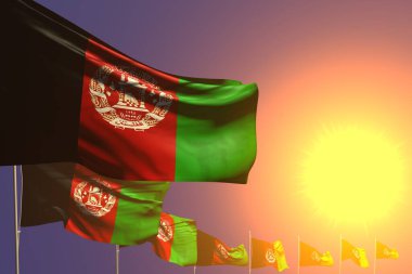 Gün batımına yerleştirilmiş pek çok Afganistan bayrağı. Mesajınız için bir yer. Herhangi bir bayrak 3D illüstrasyon.