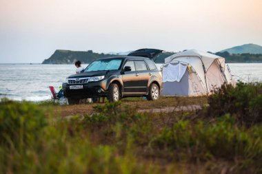 Zarubino, Russia - July 30, 2018: Camping at sea coast