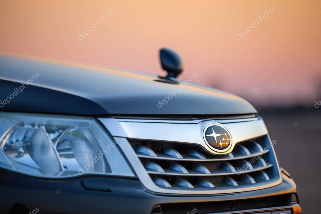 Khabarovsk, Russia - May 3, 2019: Subaru grill with logo in front of sunset