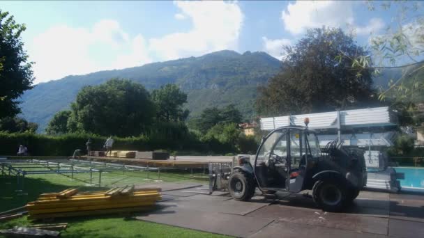 Installation work. Installation of flooring on the street. Aluminum construction. Time lapse. City Of Como. Italy 14.05.2019 — Stock Video