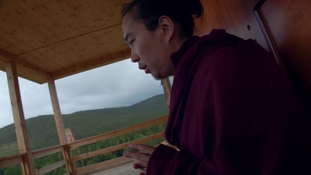 Buddhist Monk Praying Cloudy Day — Stock Video