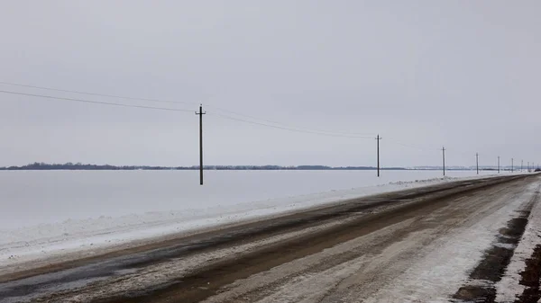 Winter road in the steppe, Russia