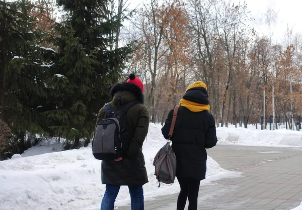 Young people in the park on a winter day.
