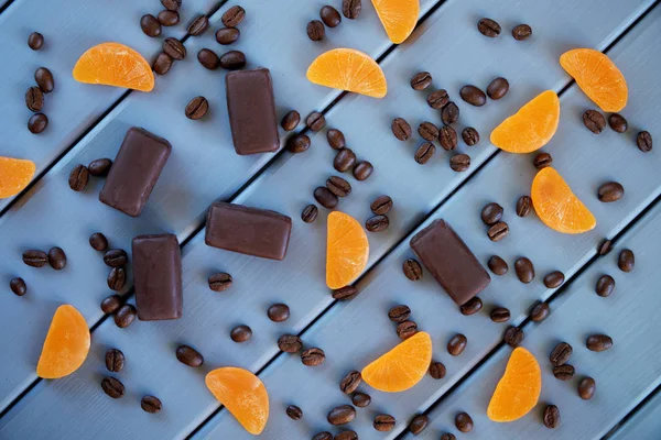 Marmalade in the form of tangerine slices and chocolate candies