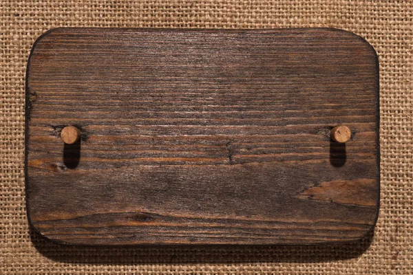 Dřevěný Rám Vyroben Tmavého Dřeva Dřevěným Roubík Leží Pytlovina Místo — Stock fotografie