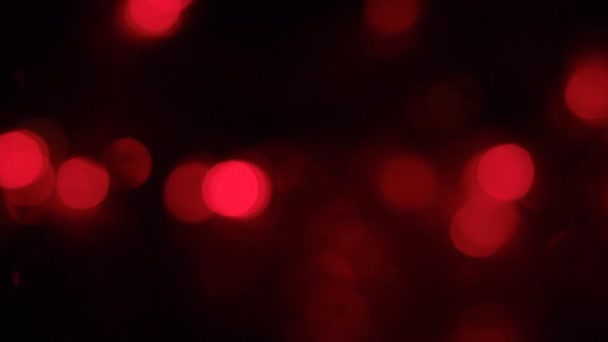 Rotation des bunten und blinkenden Weihnachtsbokeh. abstrakter Hintergrund mit Bokeh, — Stockvideo