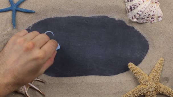 Handwritten word SOCHI written in chalk, among seashells and stars. Top view. — Stock Video