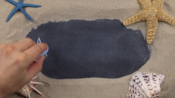 Handwritten word ANTALYA written in chalk, among seashells and stars. Top view. — Stock Video