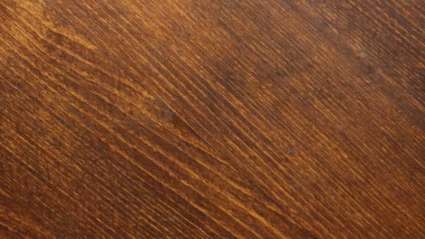 Fond de texture en bois brun. Rotation. Surface en bois brun . — Video