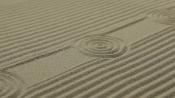 Cercles et lignes sur le sable. Texture de sable. Slider shot . — Video