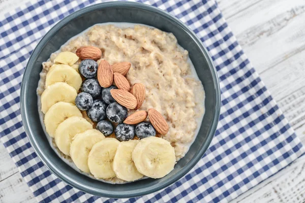 Cuenco Avena Gachas Avena Con Plátano Arándanos Almendras Sobre Fondo —  Fotos de Stock