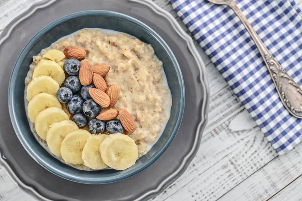 Cuenco Avena Gachas Avena Con Plátano Arándanos Almendras Sobre Fondo —  Fotos de Stock