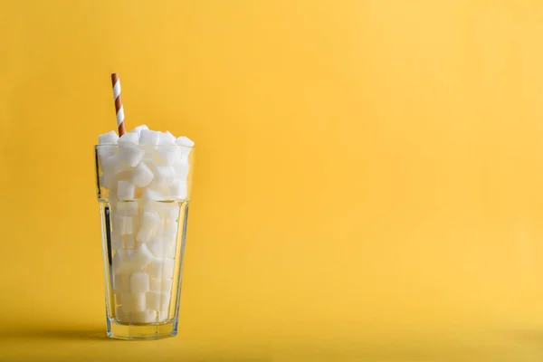 Glass Full Sugar Cubes Drink Straw Yellow Background Unhealthy Diet — Stock Photo, Image